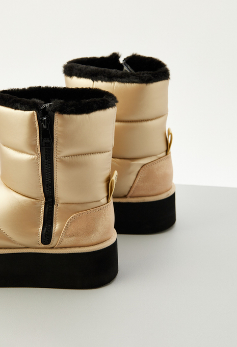 Дутые полусапоги